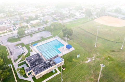 Aerial view of Wellington Vein Center in Boca Raton near pool and baseball field.