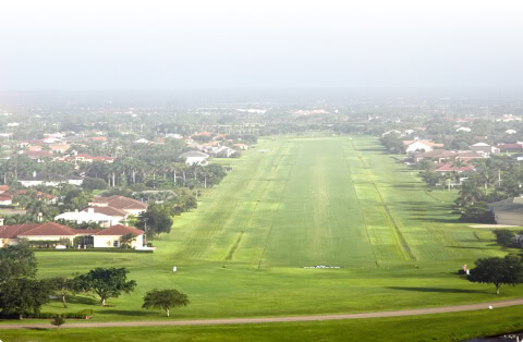 Aerial view of Boca Raton vein treatment center near residential homes and trees.